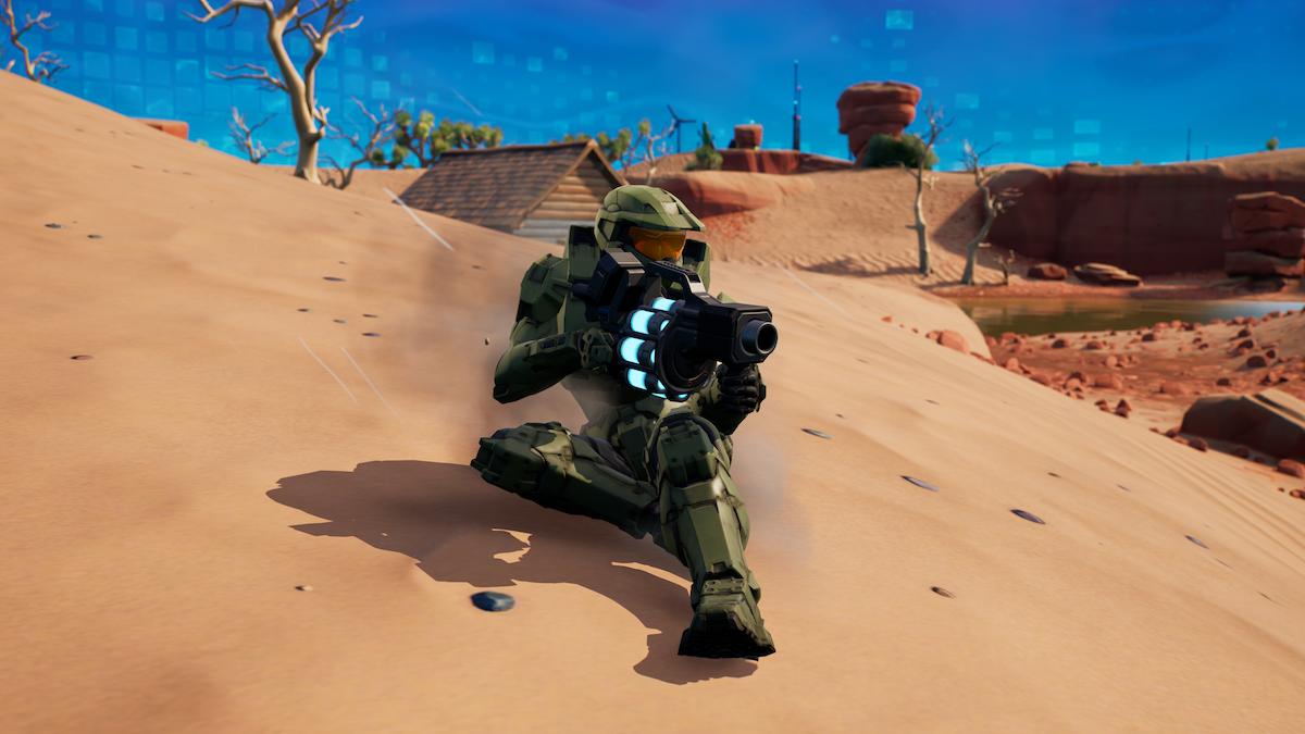 Master Chief slides while holding the Recon Scanner weapon